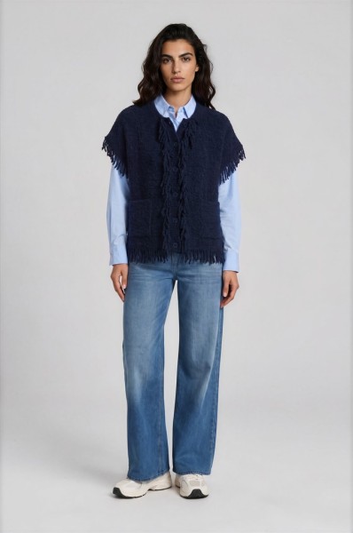 sleeveless roundneck vest with raveled thread on sleeve, neck